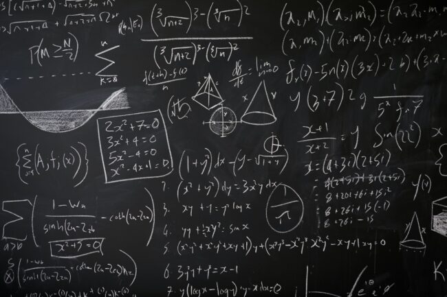 Blackboard with maths statistics, equations and ideas